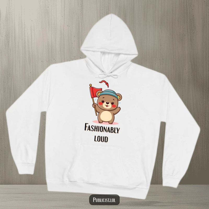Funny Hoodie featuring a playful bear in a chic hat, enthusiastically waving a bright red banner for humorous celebratory occasions.