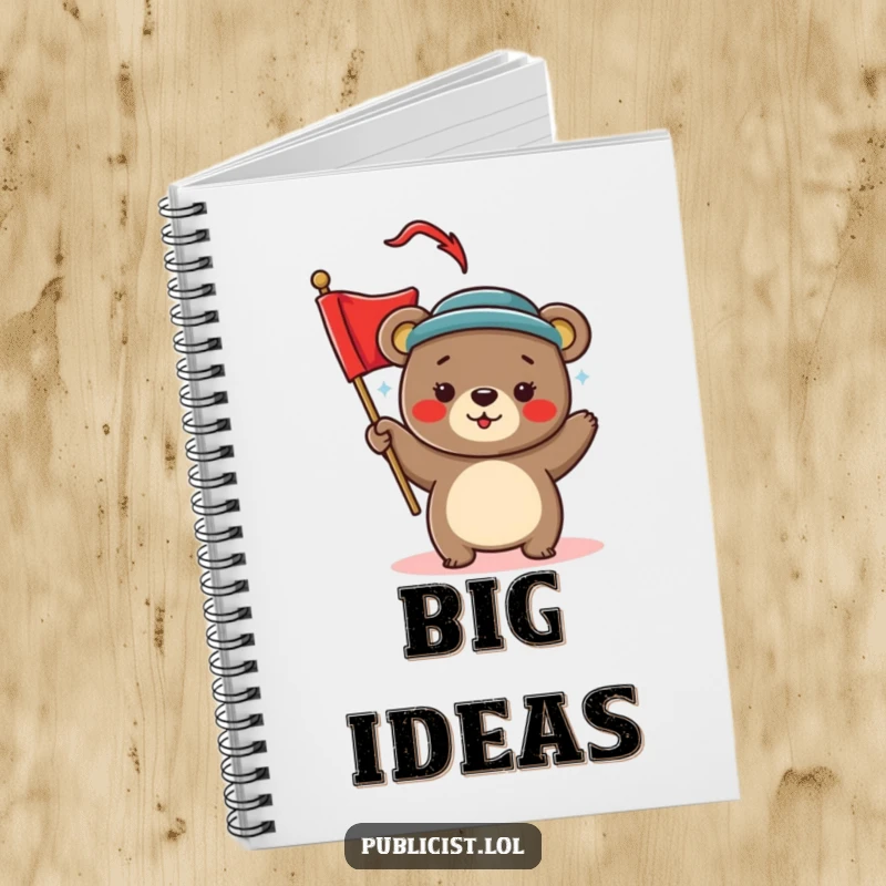 Funny Notebook featuring a playful bear in a stylish hat waving a red banner, inspiring humorous planning and note-taking.